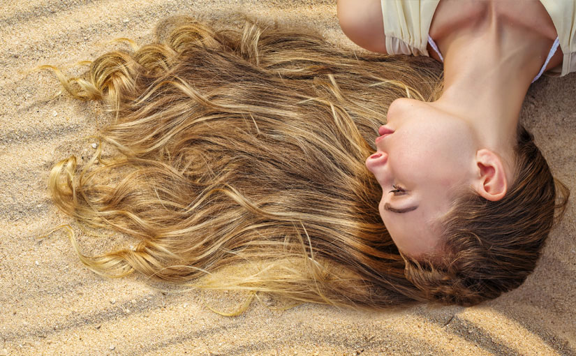 Come proteggere dal sole la pelle e i capelli